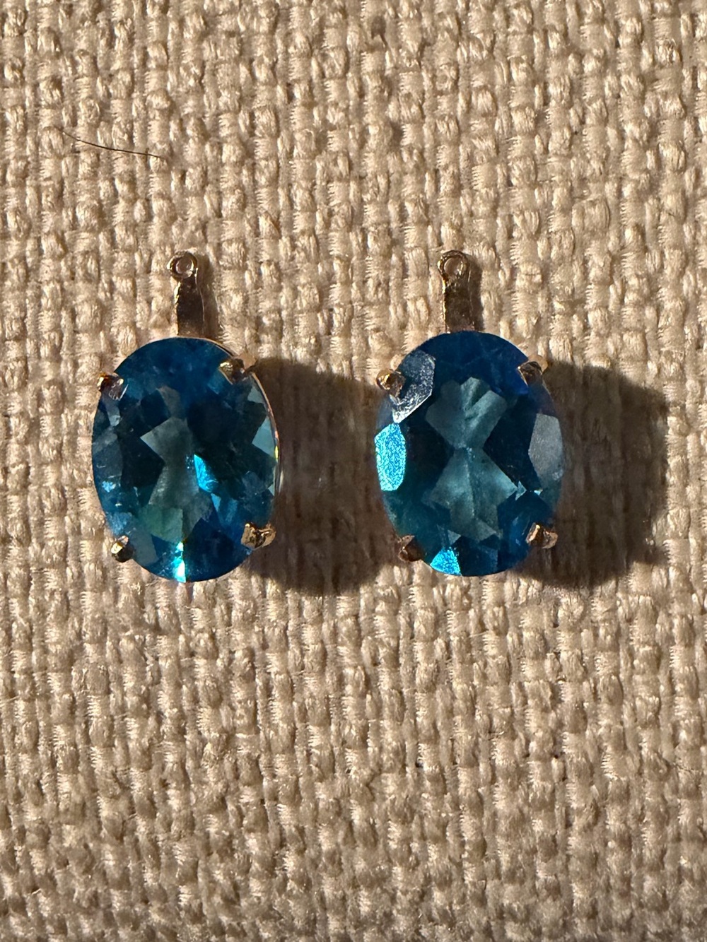 Swiss Blue Oval Topaz Drop Earring Charm//Drops in a 4-prong 14K gold mounting.